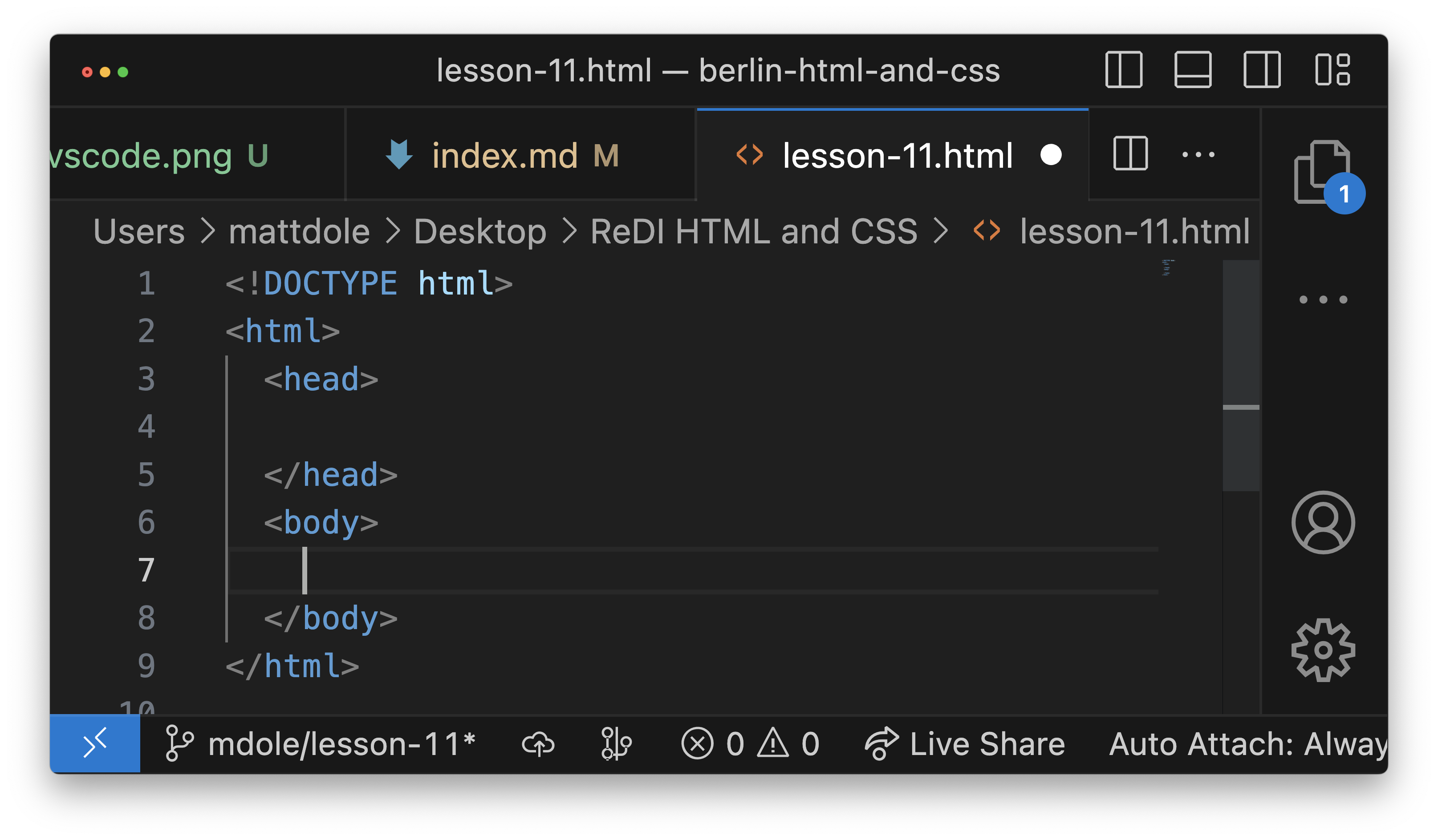 Screenshot of an HTML file with DOCTYPE, html, head, and body tags